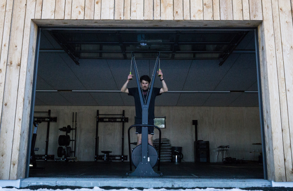 man on skierg in gym